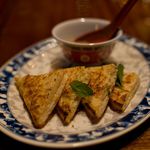 Shrimp toastÂ  with Chinese sausage gravy  (Sam Horine/ Gothamist) 